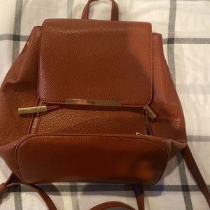 Cognac small back pack w gold accent nwot